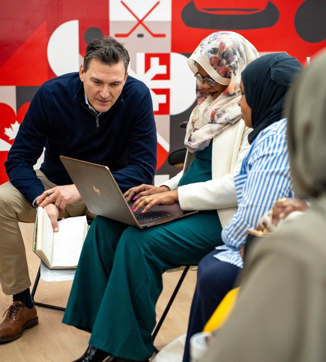 Evan Solomon meeting with residents at a community information session